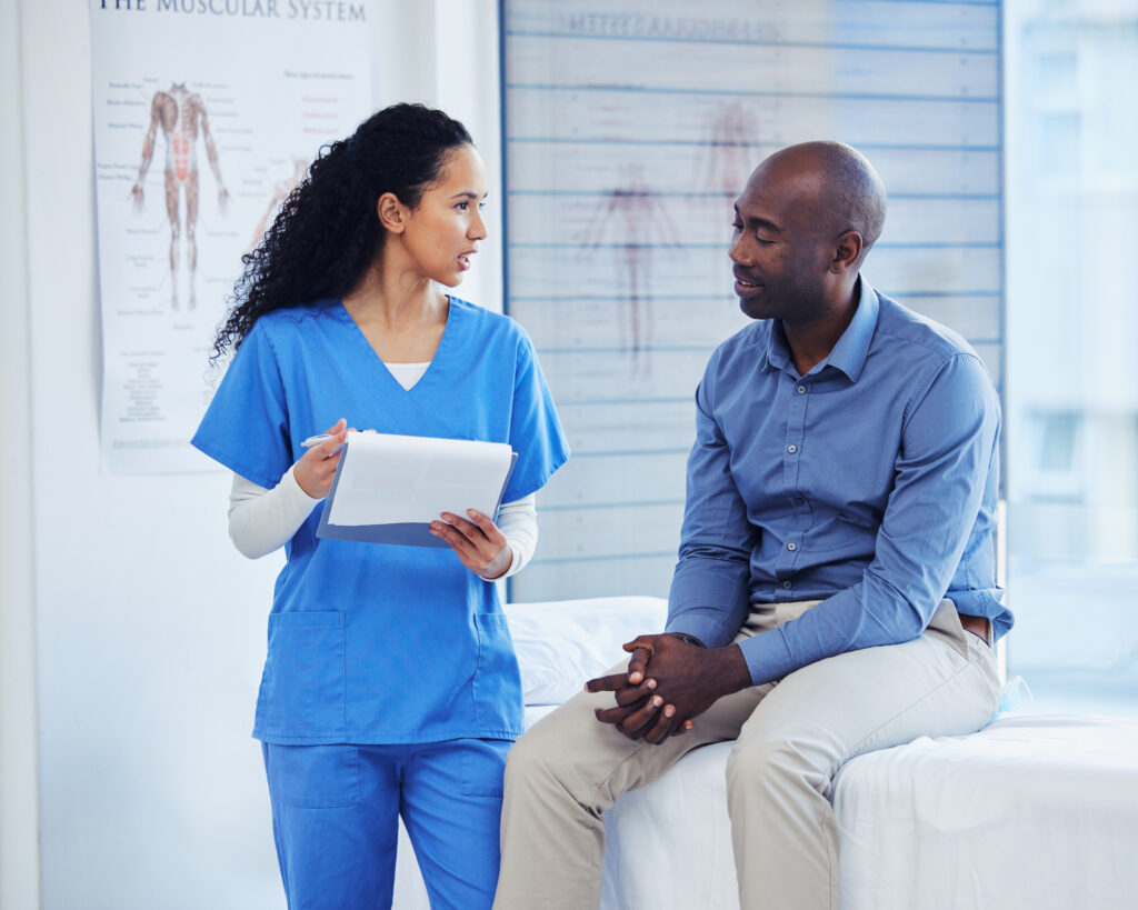Patient, Nurse And Healthcare Clipboard In Hospital For Health Insurance Consultation. Patient And Professional Nurse Woman Talking About Symptoms, Wellness And Questions Or Advice For Healthy Life