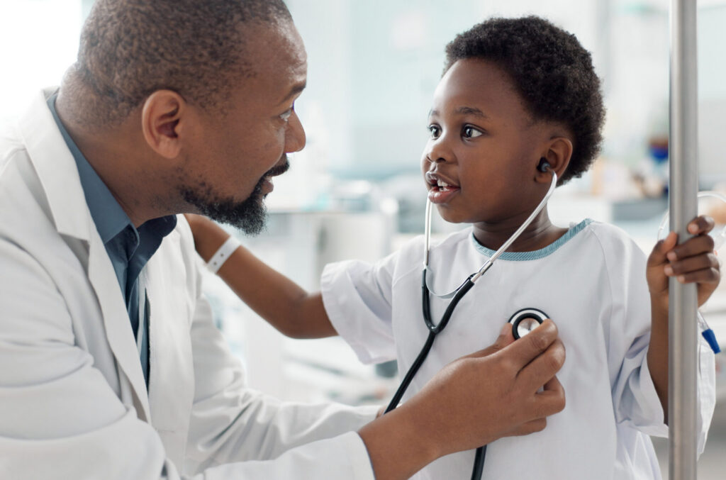 Doctor, Patient And Child With Stethoscope, Hospital And Check Up For Health, Breathing And Illness. Smile, Playing And Pediatrician For Wellness, Medical And Asthma For Heart, Healthcare Or Medicine